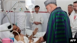 Ông Karzai đến thủ đô Kabul hôm nay để thăm một số nạn nhân trong số hơn 160 người bị thương trong các vụ nổ bom.