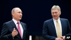 Rusya Cumhurbaşkanı Vladimir Putin ve Kremlin Sözcüsü Dmitry Peskov