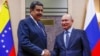 Tổng thống Nga Vladimir Putin bắt tay Tổng thống Venezuela Nicolas Maduro tại cuộc họp ở tư dinh Novo-Ogaryovo của Tổng thống bên ngoài Moscow, ngày 5/12/2018.