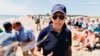 President Joe Biden stops and speaks to members of the media as he walks on the beach with his granddaughter Natalie Biden and daughter Ashley Biden, in Rehoboth Beach, Del., June 20, 2022. 