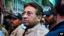 Pakistan's former President and military ruler Pervez Musharraf arrives at an anti-terrorism court in Islamabad, Pakistan, Apr. 20, 2013.
