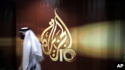 Nhân viên của đài Al Jazeera tại Doha, Qatar.