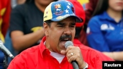 Tổng thống Venezuela Nicolas Maduro phát biểu trong một cuộc tập hợp ủng hộ chính phủ và kỉ niệm 20 năm cách mạng xã hội chủ nghĩa ở Caracas, Venezuela.