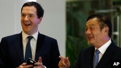 Bộ trưởng Tài chính Anh George Osborne tại Trung Quốc, ngày 16/10/2013.