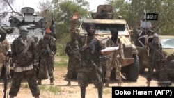 Hình ảnh chụp lại từ video do Boko Haram công bố và do AFP có được cho thấy thủ lĩnh nhóm Hồi giáo cực đoan, Abubakar Shekau.