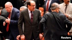 Başbakan Nuri el-Maliki Irak parlamentosunun ilk oturumunda