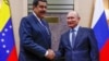 Tổng thống Venezuela Maduro và nguyên thủ Nga Putin trong cuộc gặp ở Nga cuối năm 2018.