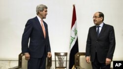 Ngoại trưởng Hoa Kỳ John Kerry gặp Thủ tướng Iraq Nouri al-Maliki tại Baghdad, ngày 23/6/2014. 